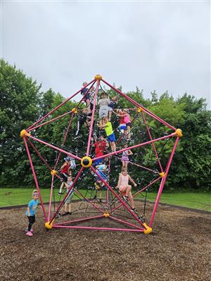 kids on a climbing structures
